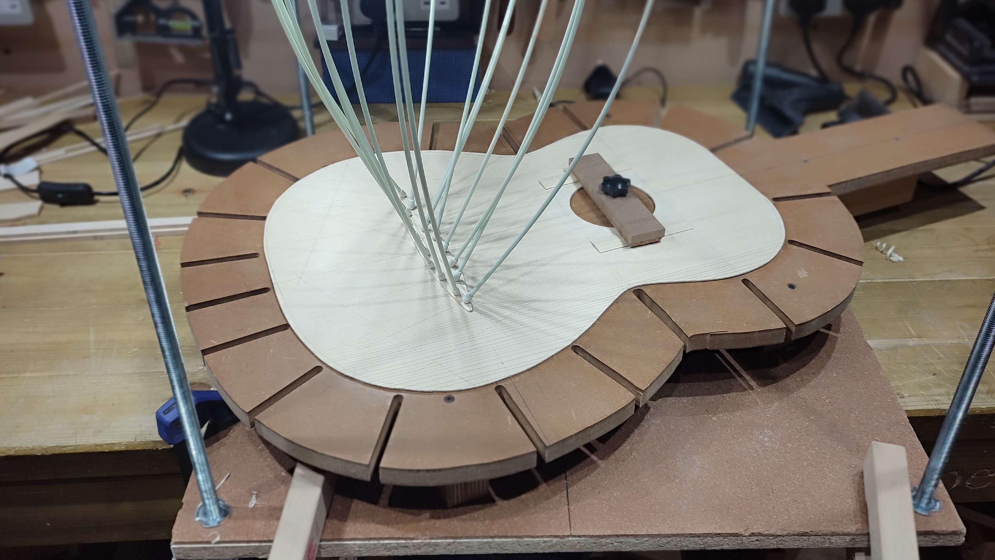 Soundboard being braced on the solera